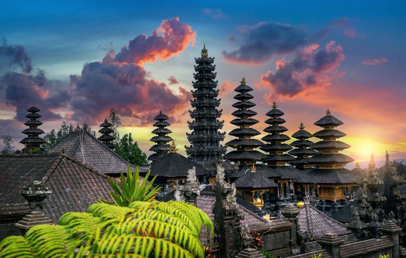 Besakih Temple complex on the slopes of Mount Agung in Bali with cloudy mountain backdrop